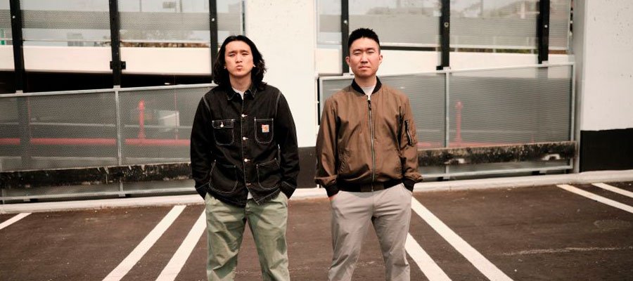 Artenzza magazine cover featuring stand-up comedians Bonggun Kim and Kansei Yasuda, rising stars in the Toronto comedy scene, known for Canada's Got Talent and Kill Tony appearances