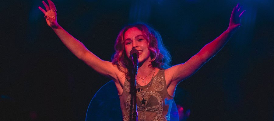 Kacey Fifield on Artenzza Magazine Cover — rising pop artist, singer-songwriter, and performer known for her EP “Seeing Stars” and emotional indie-pop sound