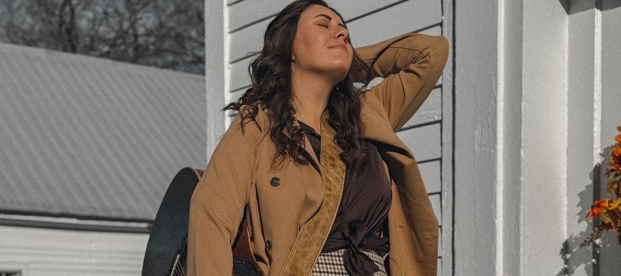 Bekka Dowland country pop singer songwriter featured on Artenzza magazine cover highlighting independent music artists and emerging country pop talent